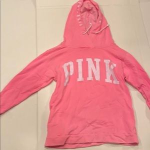 A PINK sweatshirt/hoodie.